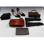 A crocodile skin handbag, a black handbag by Cordé, two other bags, a pair of lady's shoes by Slade,