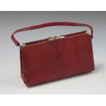 A mid-20th Century red stained lizard skin handbag by D.H. Evans, Oxford St, London, width approx