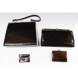 A brown leather handbag by Ackery of London, another handbag by Holmes of Norwich and two purses.