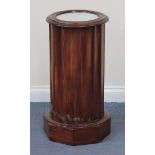 A 19th Century mahogany and white marble topped cylinder commode with fluted sides and a single