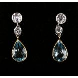 A pair of aquamarine and diamond earrings, each collet set with a pear shaped aquamarine to the drop