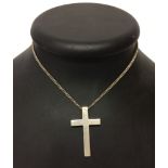 A heavy silver cross & chain dimensions 4cm x 2.5cm and 4mm deep on 22" chain. Approx 21.7g.