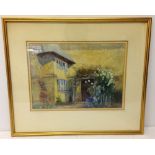 A framed & glazed watercolour of a cottage signed H. Fish. 42 x 50cm frame size.