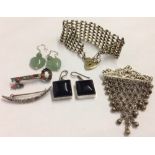 A collection of silver jewellery comprising 2 pairs of silver drop earrings (a square pair set