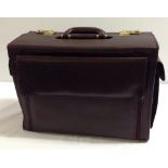 A large leather briefcase.