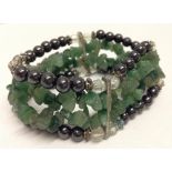 A bracelet made from haematite beads and aventurine stones.