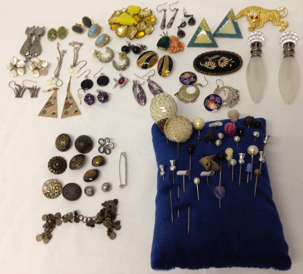 A collection of costume jewellery, hat pins, buttons and 2 scent bottles.