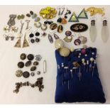 A collection of costume jewellery, hat pins, buttons and 2 scent bottles.