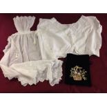 A Victorian ladies lace bodice, a Victorian childs lace apron and a velvet embroidered drawstring