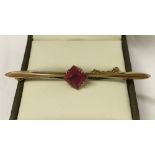 Vintage 9ct gold bar brooch set with large pink tourmaline, with safety chain. Approx 5.5cm.