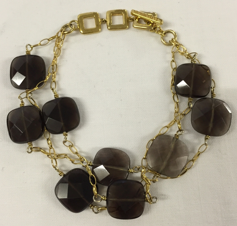 A designer Tateossian London smokey quartz gold plated silver costume jewellery 3 string bracelet.