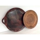 2 vintage carved wooden trays. One 39cm diameter, the other 44cm diameter.