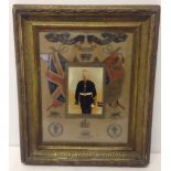 A c1914 gilt framed, hand coloured photograph of an artilleryman with hand drawn and coloured