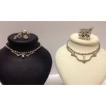 2 vintage diamante necklaces, one with aurora borealis stones, the other with white stones, both