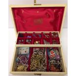 A musical jewellery box containing vintage and modern costume plus a small quantity of 9ct gold