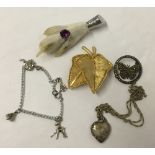 A collection of silver & costume jewellery items comprising silver locket & chain, silver &
