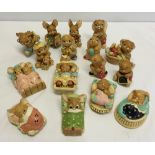 A collection of 16 boxed Pendelfin stonecraft rabbit figures.