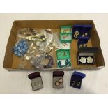 A tray of costume jewellery items to include necklaces, earrings and bracelets.