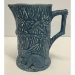 A Wade rabbit jug in blue #169 impressed in base. 19cm (7½ Inches) tall.