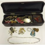 A box containing a collection of vintage & modern costume jewellery.