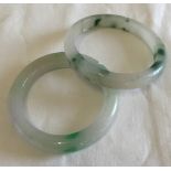 Pair of jade bangles- internal sizes 52 & 59mm