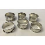 A collection of 6 silver napkin rings. Approx weight 84g.