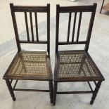 2 cane seated oak tall chairs.