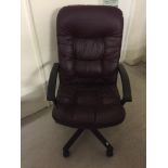 A maroon office chair.