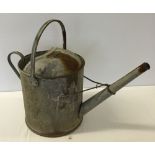 Vintage galvanised  watering can approx 40cm high.