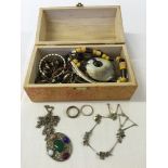 A wooden box containing vintage & modern costume jewellery including a Scottish design pendant and