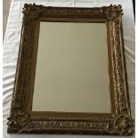 A mirror in gilt Victorian frame.