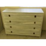 A pine 4 drawer chest of drawers in limed finish. 103.5cm wide.