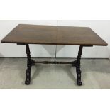 A late 19th/early 20th century mahogany table with carved legs. Top 82 x 51cm.