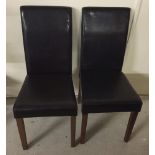 2 modern dark brown dining room chairs.