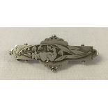 Silver bar brooch with Lily of the Valley design in an Art Nouveau style. Approx 4cm wide.