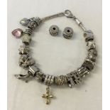 925 silver Lovelinks style bracelet with 18 charms, some marked 925.