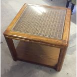 A square cane & glass topped coffee table. Top approx 166cm square.