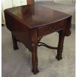 A mahogany drop leaf coffee table with fretwork stretcher and square carved legs. Size when