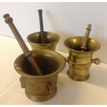 3 heavy brass pestle & mortars.