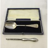 A cased Victorian silver tea spoon hallmarked London 1878. Approx 21.7g with a silver handled