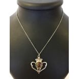 A Heathergems heart shaped pendant with coloured heather stem centre (boxed).