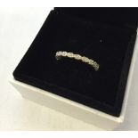 A silver daisy chain style ring size Q (boxed).