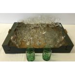 A box of assorted glasses to include 2 green Coca-Cola can shaped glasses.