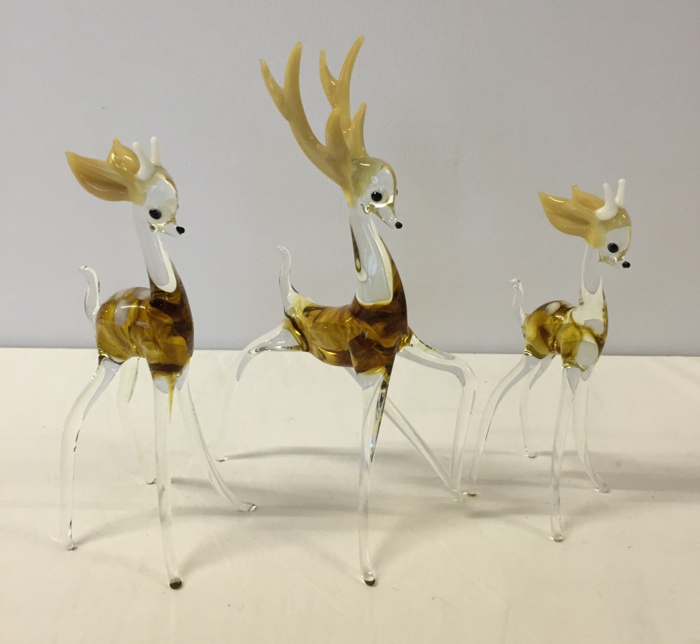 Large Murano glass deer family including stag with antlers. Largest 21cm tall.