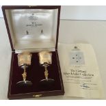 A Limited Edition pair of hallmarked silver wine goblets commemorating the Queens Silver Jubilee