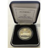 A 1999 silver proof Alderney five pounds coin commemorating a Total Solar Eclipse in presentation