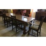 A large 2 plank oak dining room table & 6 chairs (4 + 2 carvers). Table approx 8' 3" (252cm) long.