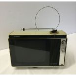 A 1960s Hitachi Solid State portable TV.