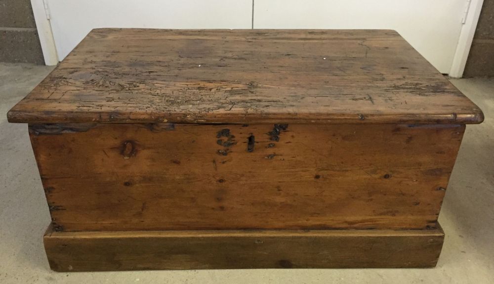 Antique pine trunk with metal handles. 78 x 51cm.