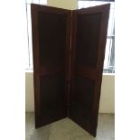 A vintage 2 panel mahogany screen/doors.